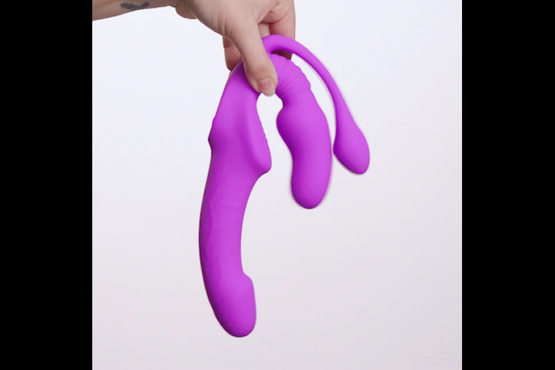 Roze strapless strap-on van Teazers met vibratie