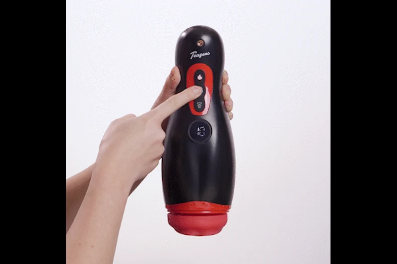 Zwarte verwarmde masturbator van Teazers met vibratie en stootritmes