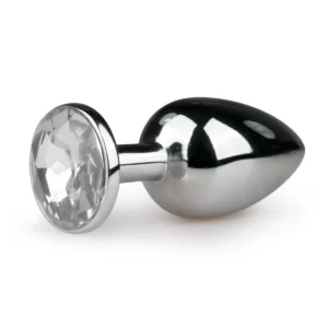 Discrete buttplug met brede basis op een rustige achtergrond